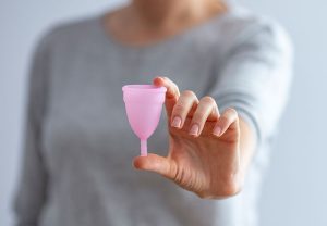 How can a menstrual cup be beneficial for women?